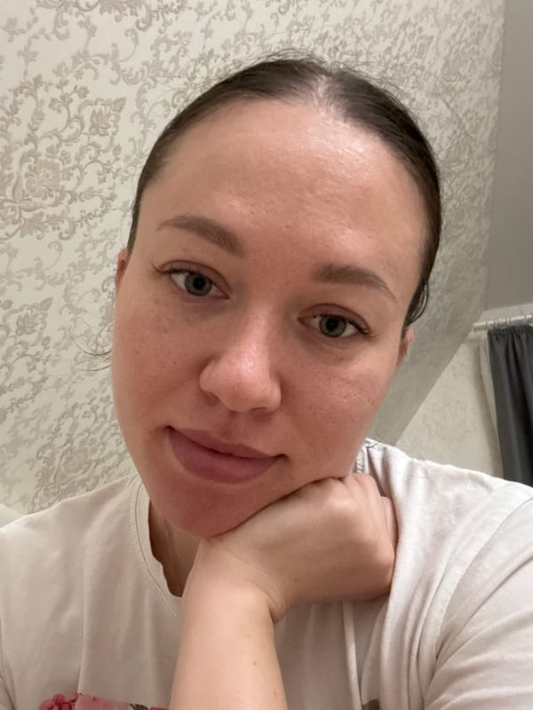 Woman Takes Selfies in White Floral Shirt in Russia