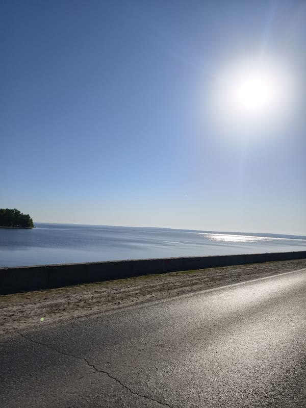 Early morning views of Volga River and roadway in Noviy