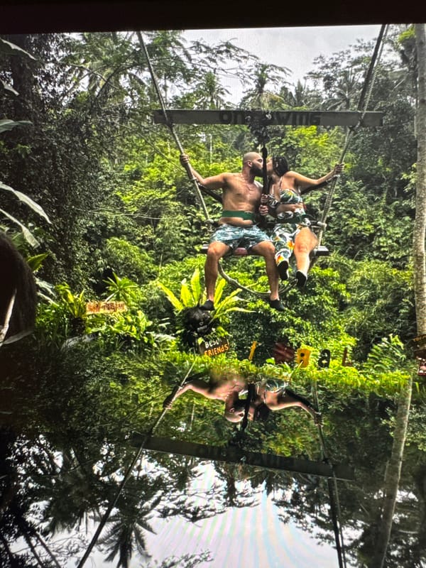 Tourists enjoy waterfall adventures at tropical resort location
