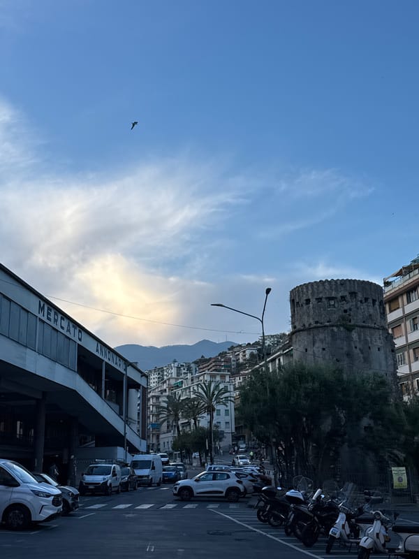 Evening stroll through historic Sanremo captures urban life and coastline