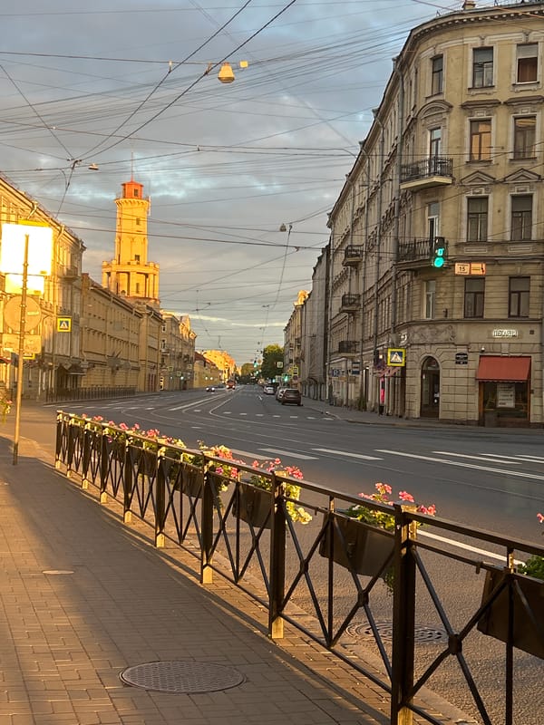 Golden-hour streets: cobblestones, ornate fences, and long shadows
