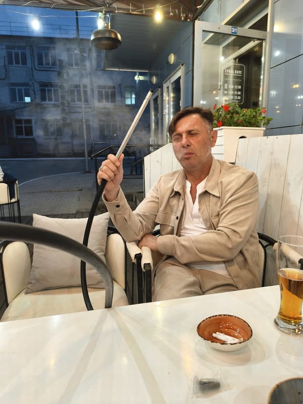 Hookah, beers, and food at a Cyrillic-branded café