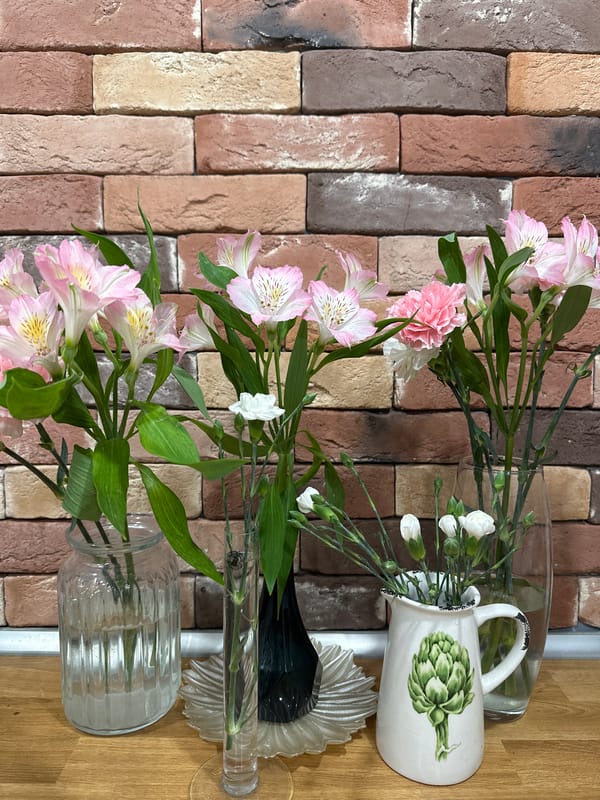 Afternoon snapshots captured in Votkinsk include flowers, ice cream, buildings