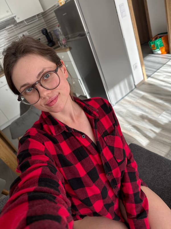 Woman takes kitchen selfie in Balatonlelle, Hungary