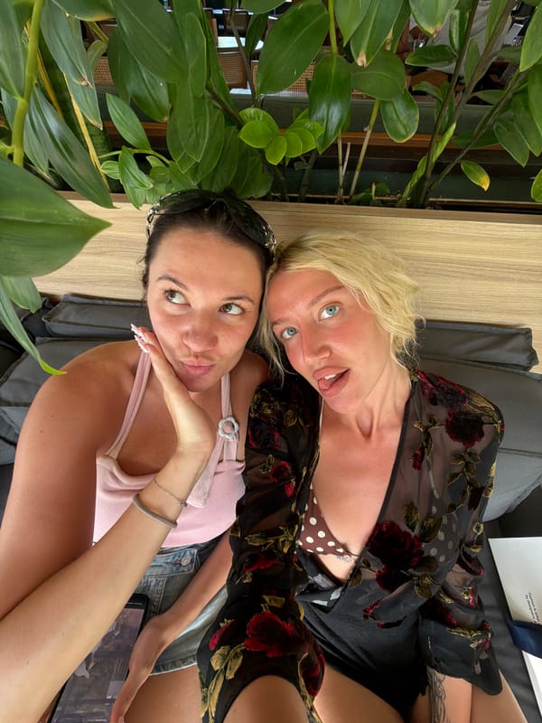 Two women enjoy morning cafe visit in North Kuta