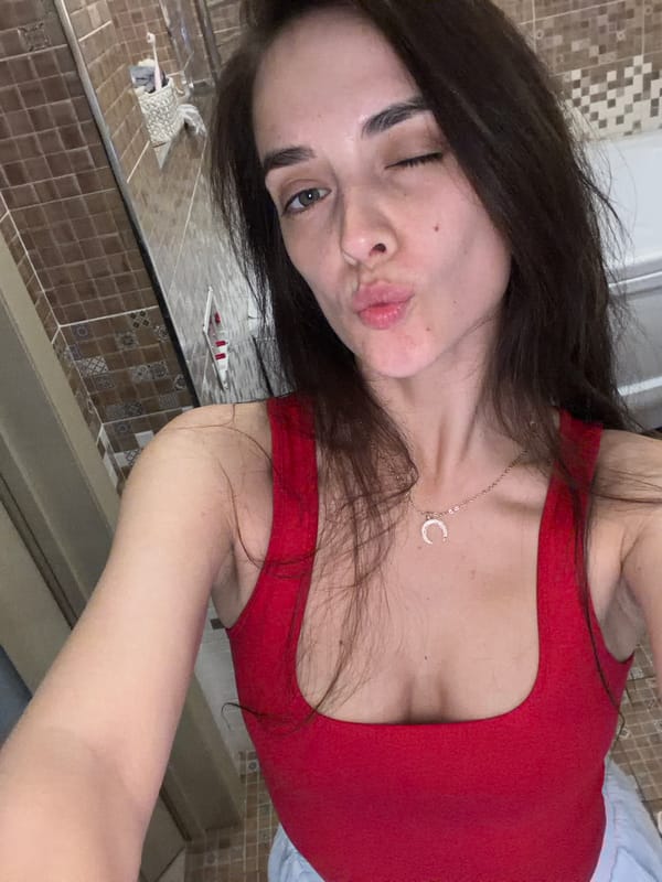 Bathroom selfie series in Ufa, red top and crescent moon necklace