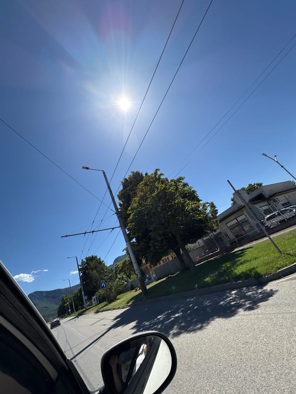 Sunny drive through Vratsa streets with traffic views