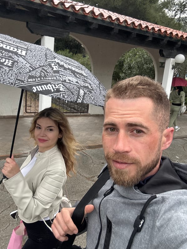 Couple documents rainy morning routine in coastal Budva