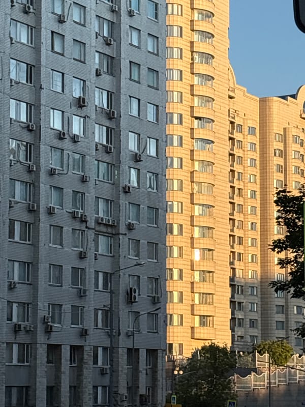 Urban architecture, golden domes, and city sunsets across an afternoon
