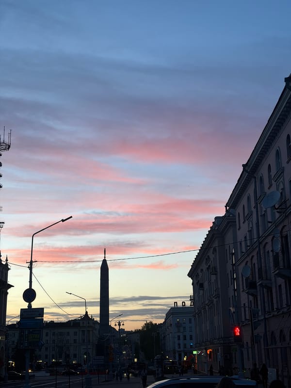 Twilight streets and decorative scooters captured in Minsk