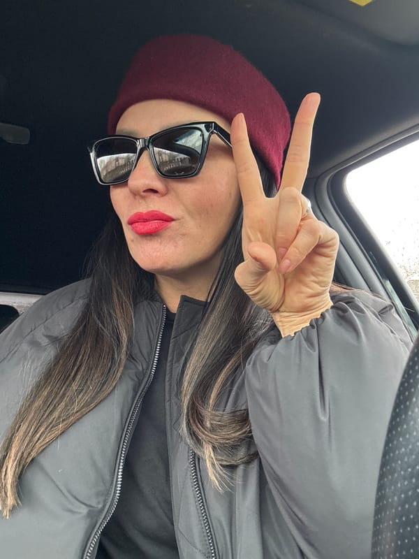 Woman photographed in vehicle interior in Chaikovsky, Russia