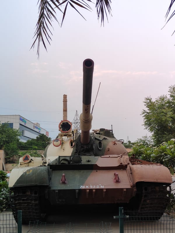 Street-level Gurgaon: monuments, everyday scenes, overcast morning