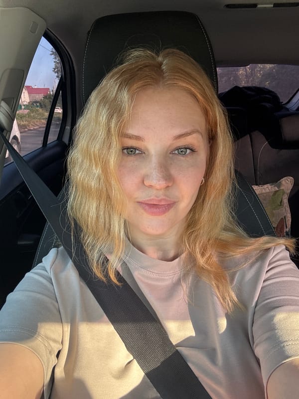 Quick driver's seat selfies on a road trip in rural Russia