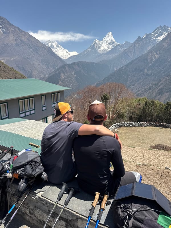 Trekkers documented during mountain village visit in Khumjung, Nepal
