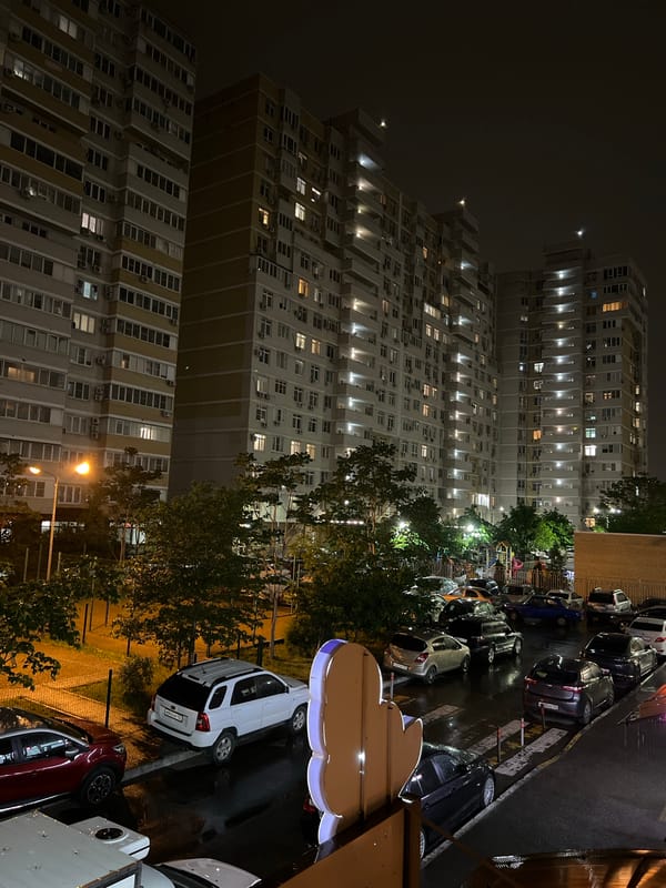 Nighttime urban photography session documents Krasnodar city scenes