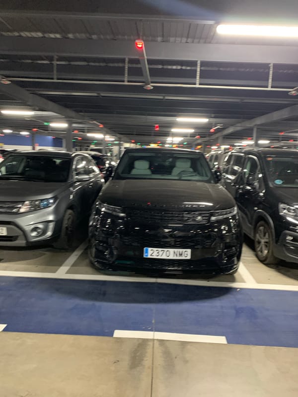 Late-night scenes from Manises Airport's parking garage and exterior