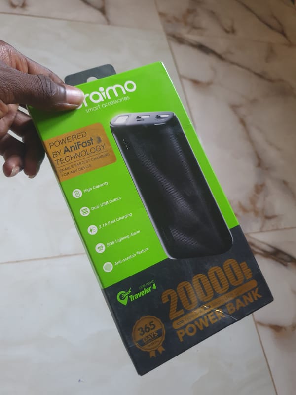 Consumer unboxes smartphone accessories and household products indoors