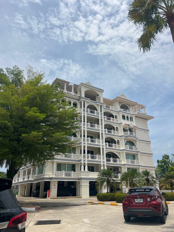 Colonial-style building with ornate balconies documented in Kathu, Thailand