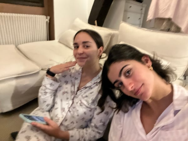 Two women share dinner at home in Paris