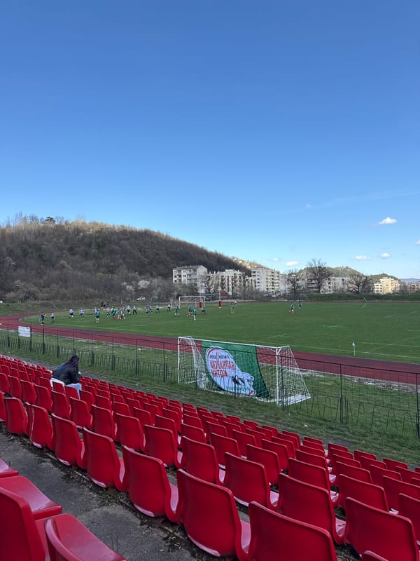 Rugby match played at Berkovitsa stadium with sparse attendance