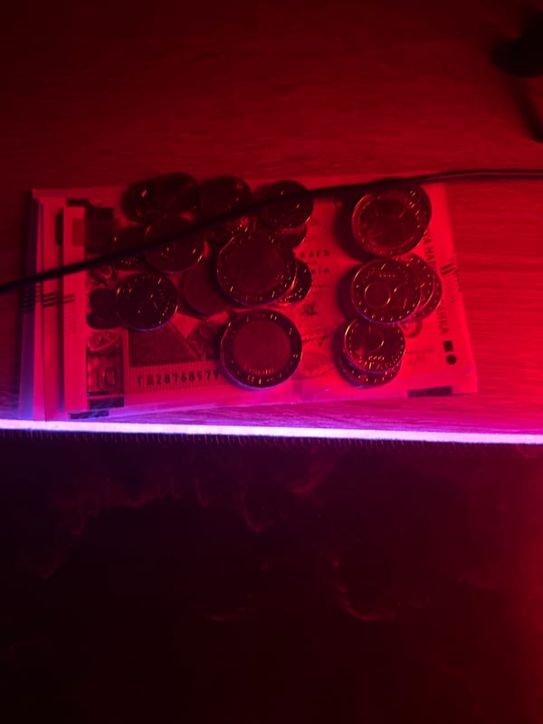 Gaming setup with RGB lighting and collectibles documented