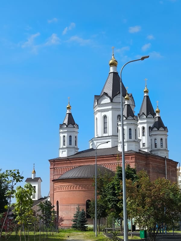 Orthodox church with golden domes stands bright in Kropotkin, Russia
