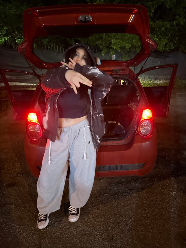 Young people rest in car trunk, Blagoevgrad evening