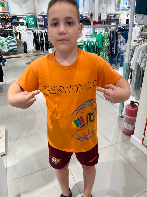 Browsing kids' clothes and Puma gear at a Kharkiv mall