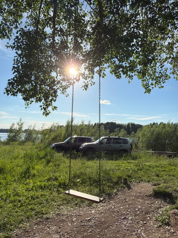 Sunny afternoon along the waterfront in Chaikovsky, Russia