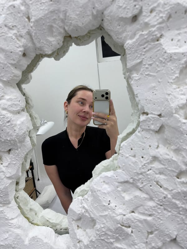 Woman takes mirror selfie in Moscow apartment