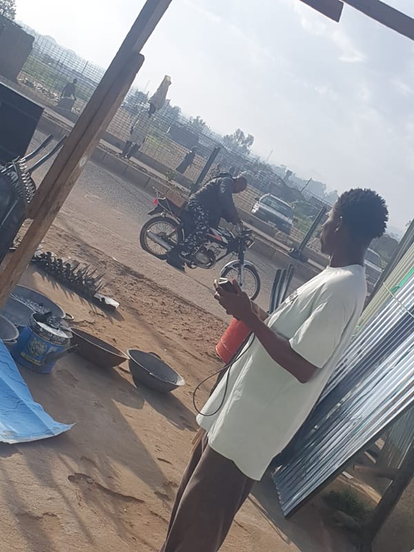 Morning street life unfolds in Bukuru, Nigeria