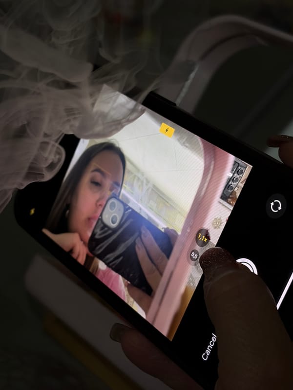 Woman documents selfie session with vaping in Port-Katon, Russia
