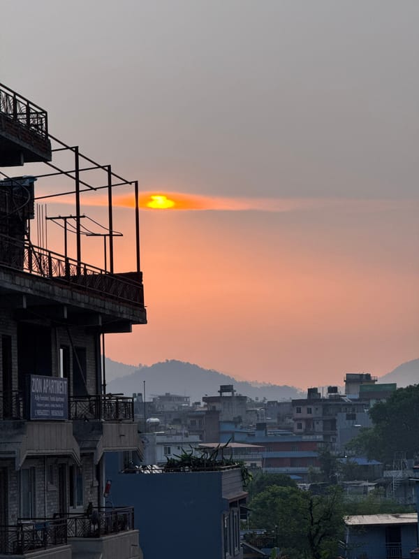 Sunset documented over Pokhara cityscape in Nepal