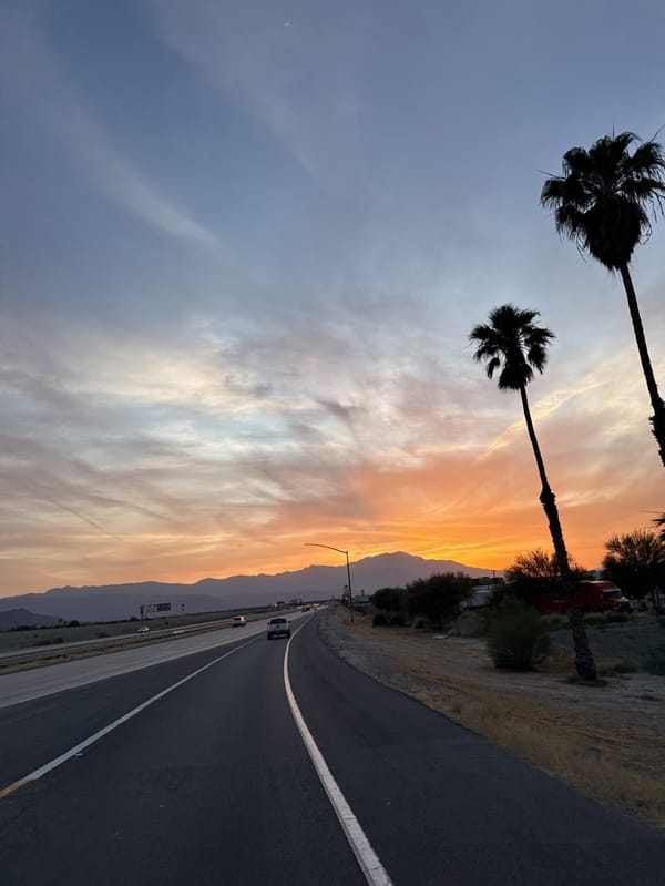Sunset captured over highway near Indio, California
