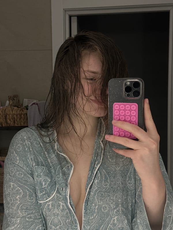 Woman Takes Bathroom Selfies in Kazan, Russia