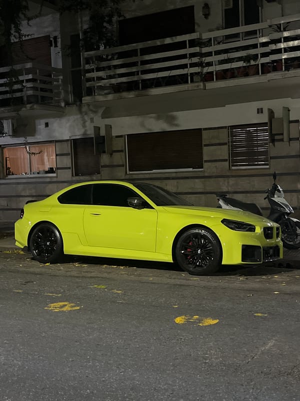 Bright Corvette spotted on wet Buenos Aires street