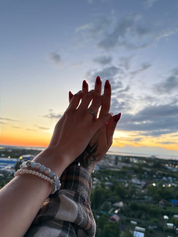 Golden hour rooftop vibes with city views and cold beers