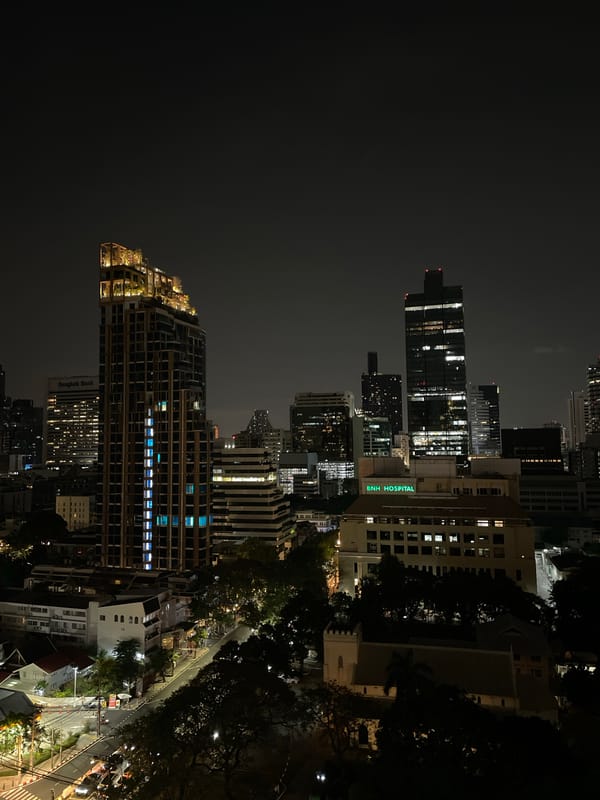 Bangkok nighttime cityscape documented from elevated perspectives