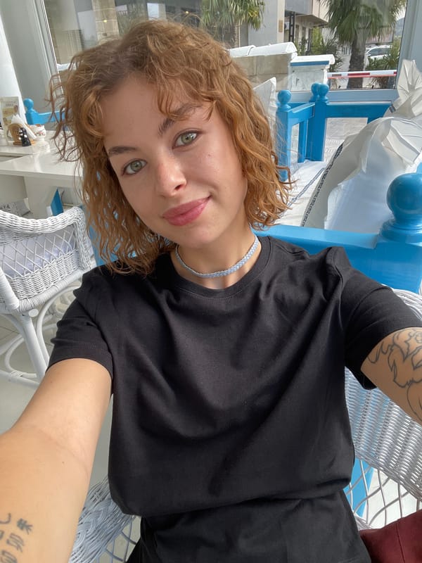 Woman documents cafe visit with Greek pastries in Podgorica