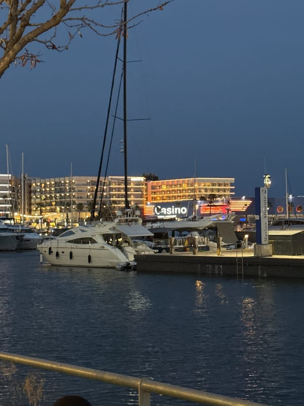Alicante marina and streets at dusk, falla installation visible