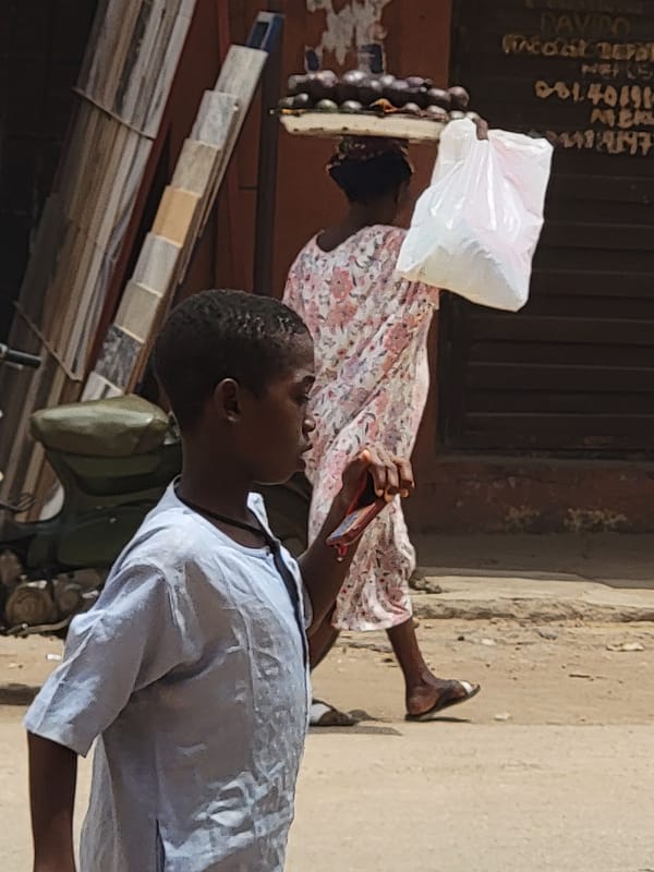 Daily life unfolds on sunny Maiburiji streets and markets