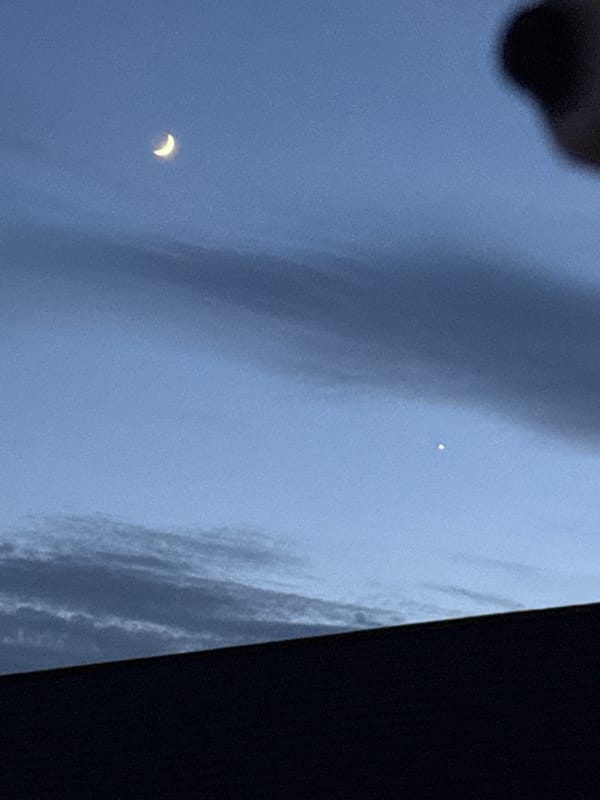 Twilight moon and urban lights observed in Great Yarmouth