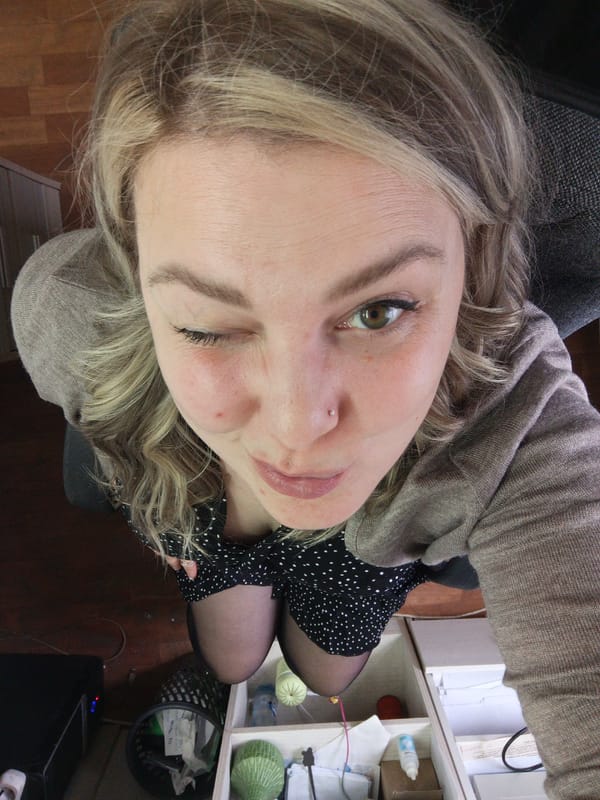 Morning observations of woman and billboard in Noviy, Russia