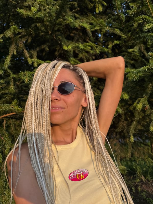 Sunny afternoon poses in Rusanovo, yellow top and bold braids