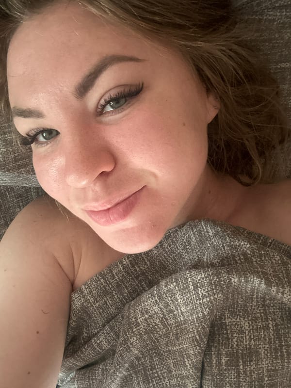 Woman photographed lying down in two sequential images