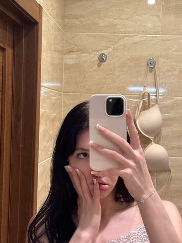 Bathroom mirror selfie session in a Khimki apartment