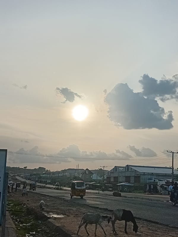 Late afternoon street life documented in Lokoja, Nigeria