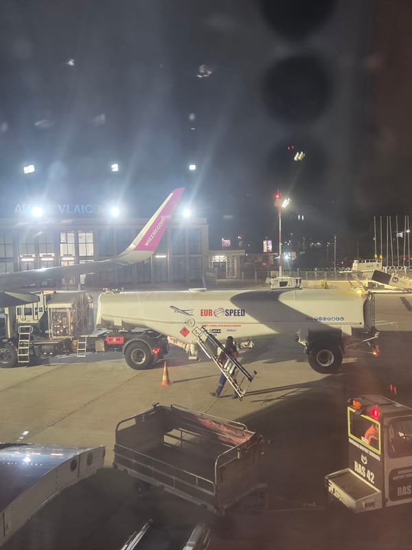 Evening flight operations captured at Bucharest's main airport