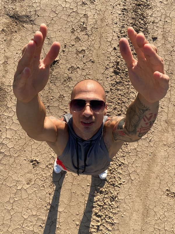 Hands up on cracked dry ground in Pleven, Bulgaria
