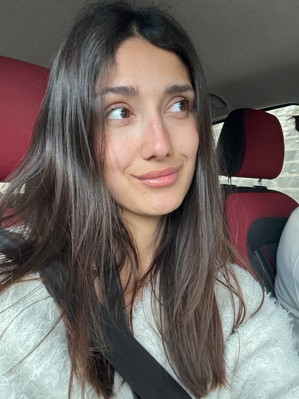 Woman takes selfie in car in Sutomore, Montenegro